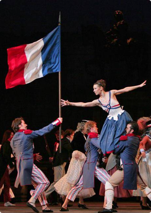 How do costumes in dance dramas reflect different social classes In the ballet "The Flames of Paris?